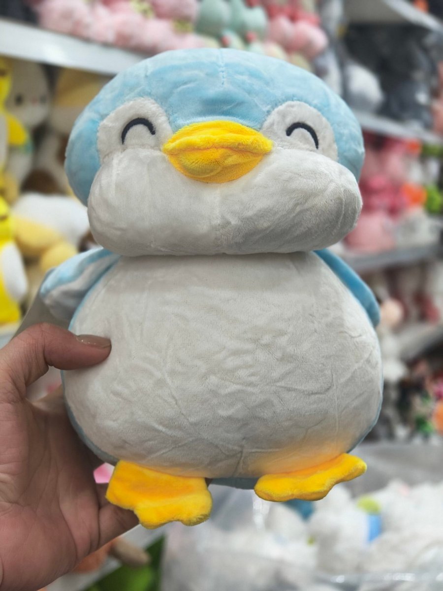 Pingüino 22cm celeste
