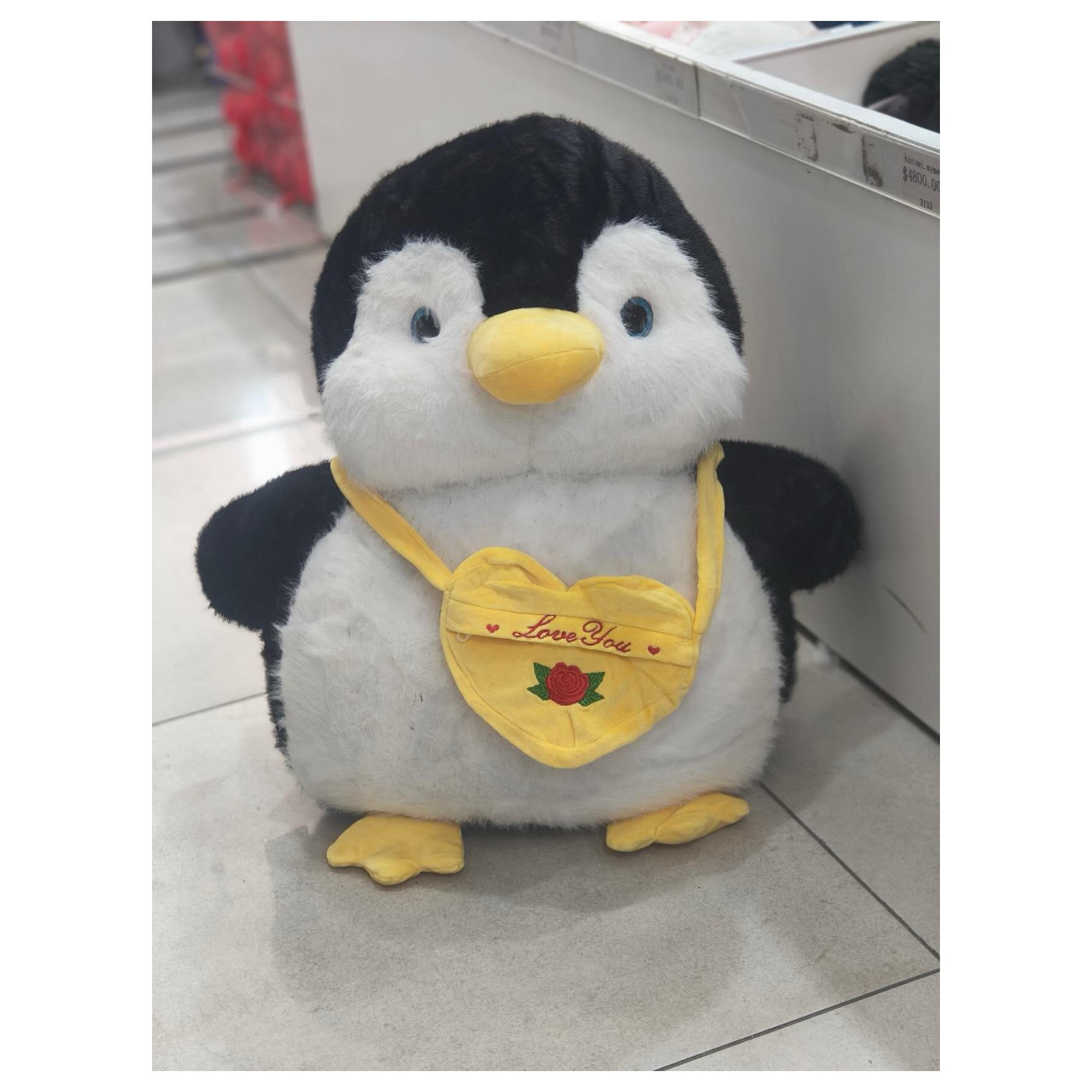 Pingüinos con cartera50cm