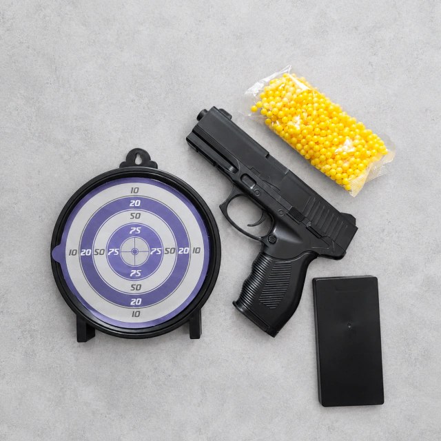 Pistola CM3 Airsoft 6 mm con Blanco de Puntería adeshivo