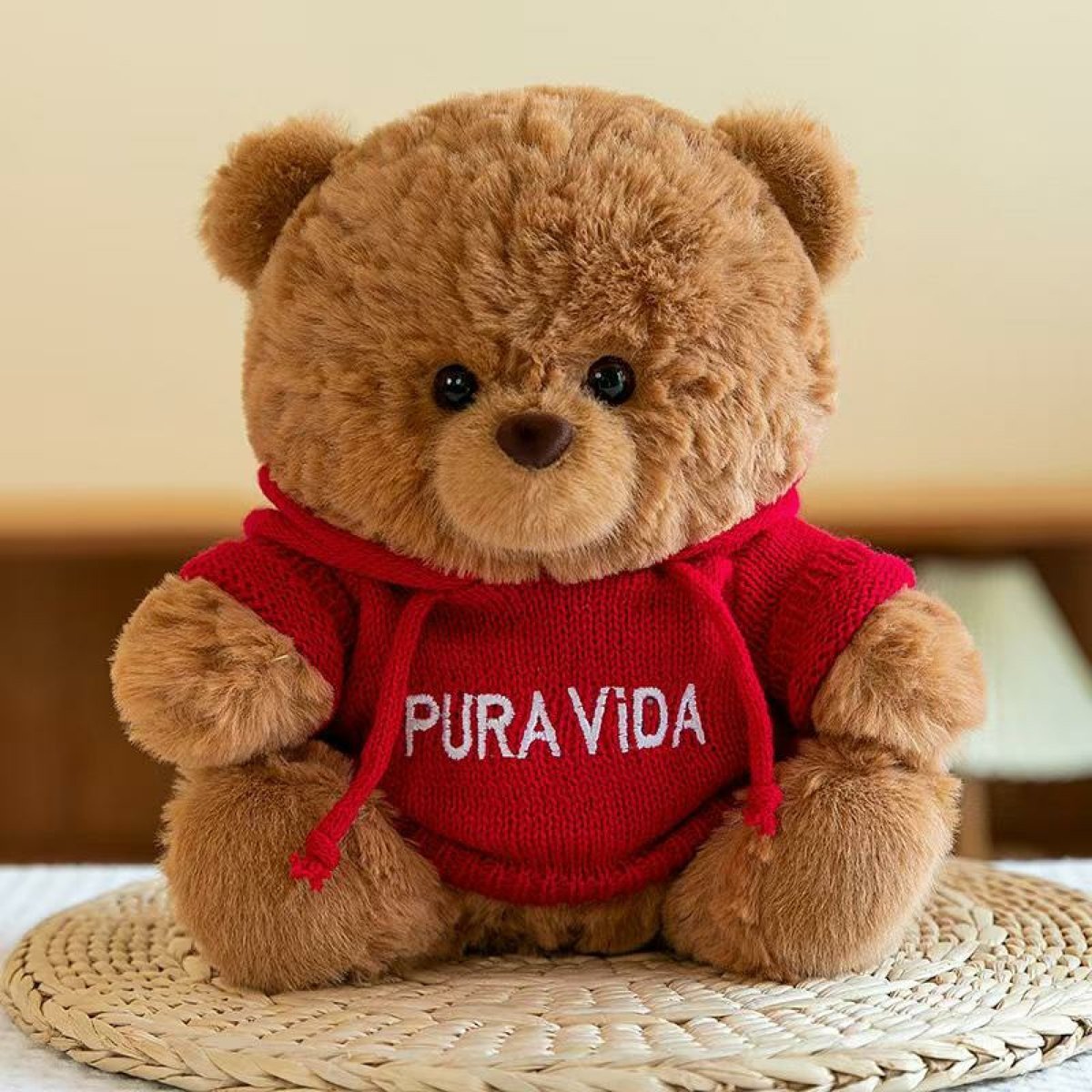 Oso con buzo Pura Vida 22cm