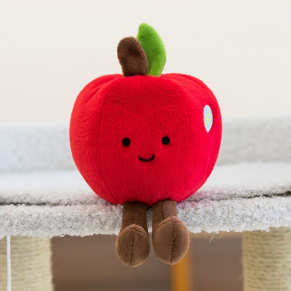 Manzana con patitas