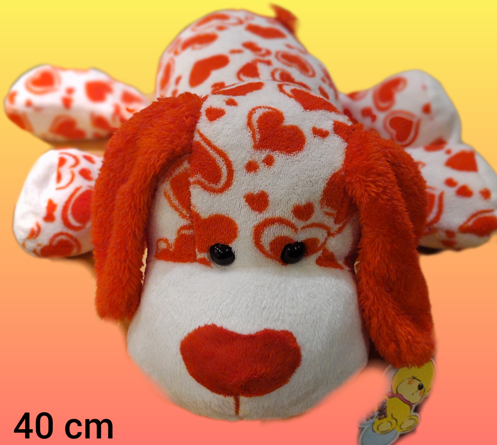 PERRO ACOSTADO CON CORAZONES 25CM