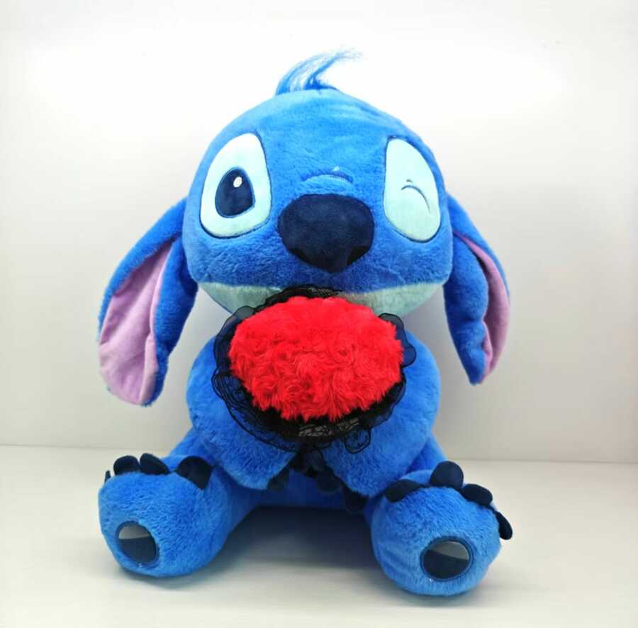 Peluche punto de costura sosteniendo una rosa ( 40cm)