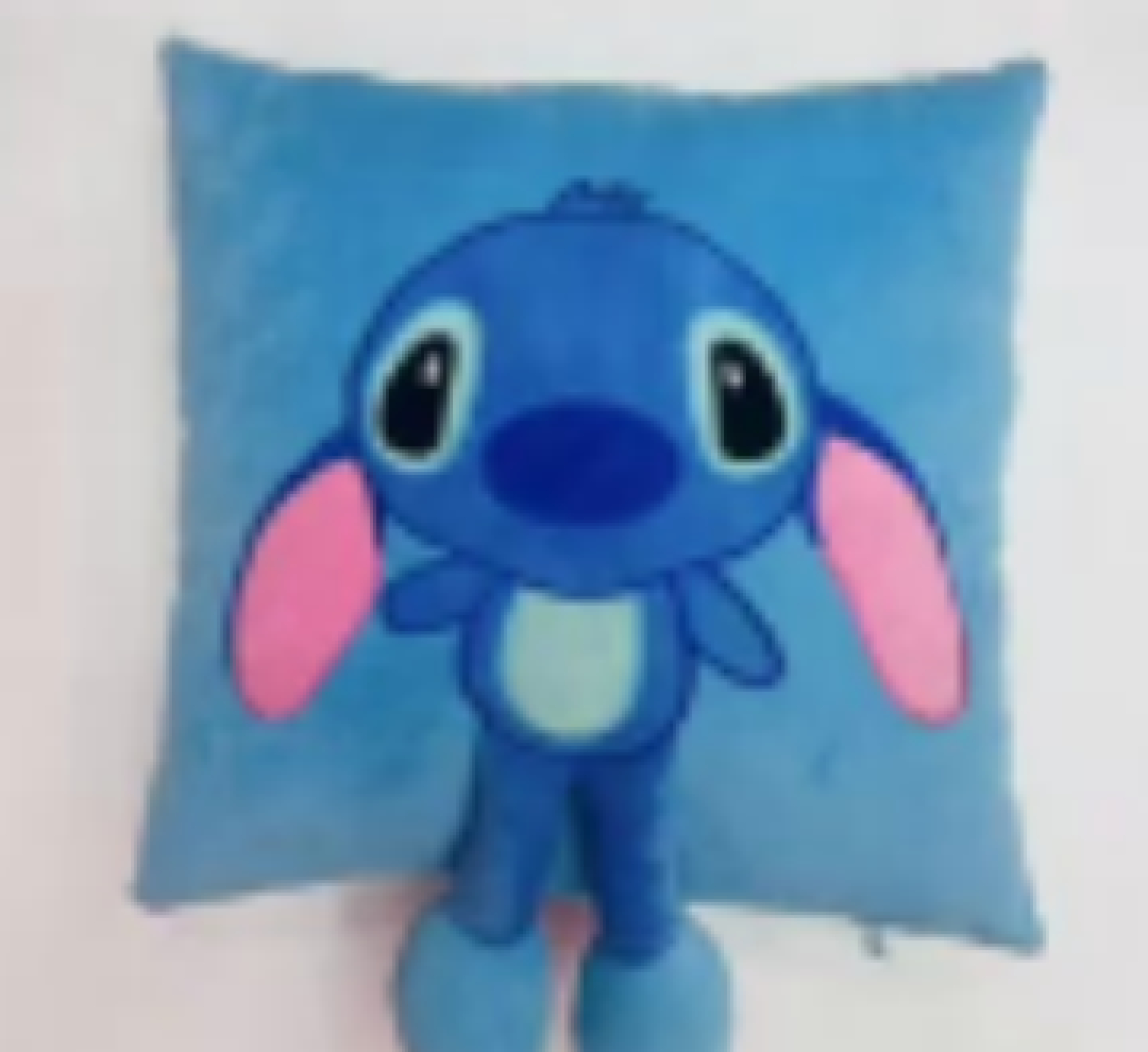 Almohada Stitch fondo azul 35cm