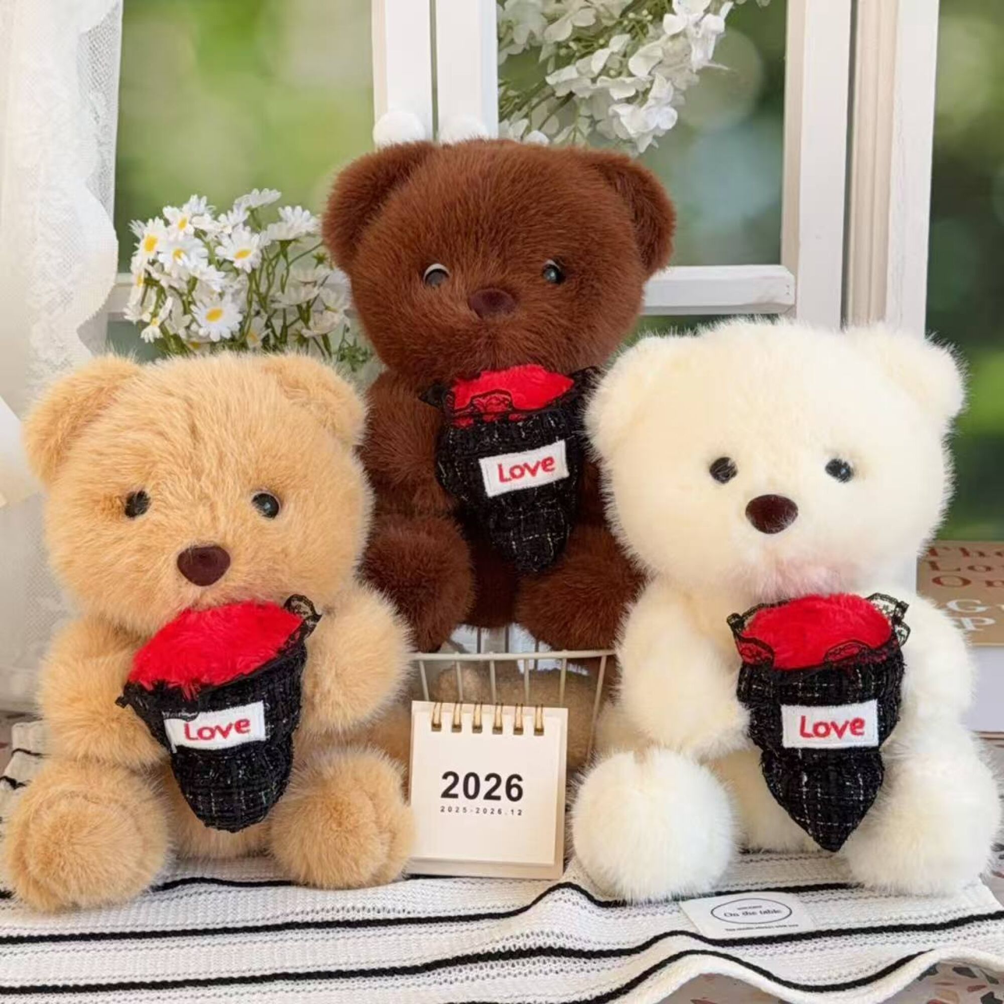 Oso con flor abrazable 23cm