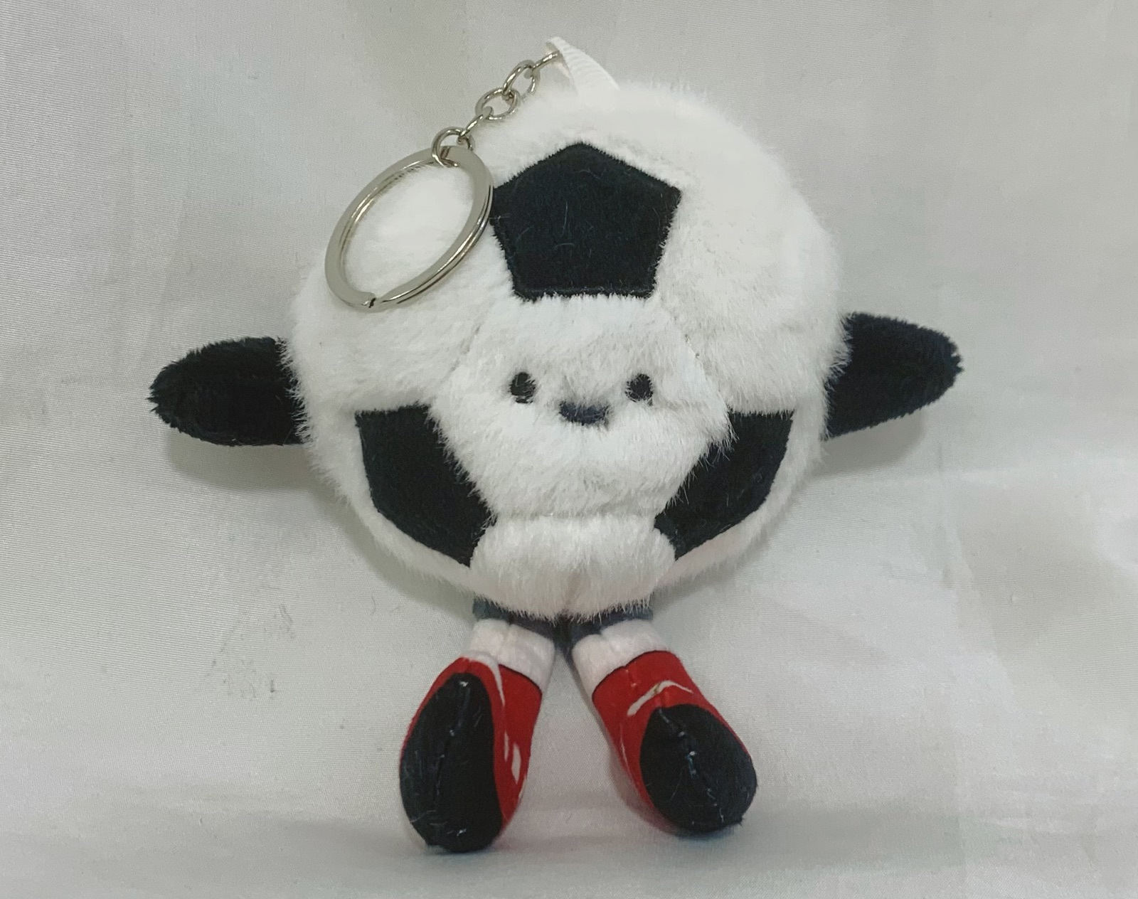 Llavero pelota con patas