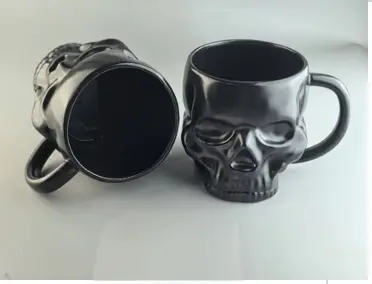 AA2720 TAZA CERAMICA NEGRA FORMA DE CALAVERA